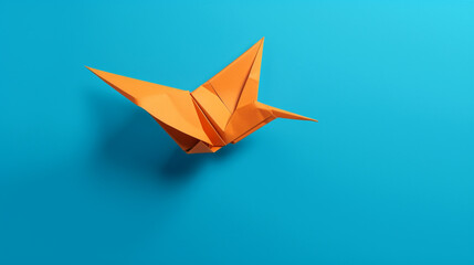 Fototapeta na wymiar orange origami bird flying on a blue background сreated with Generative Ai