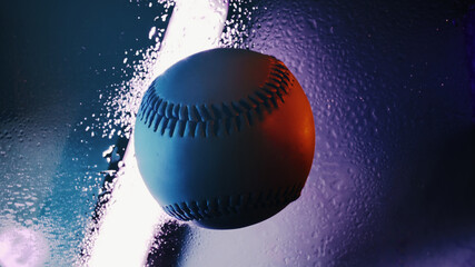 Baseball art background with wet water droplets by artistic lighting over ball for sport closeup.
