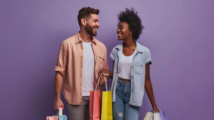 Happy couple holding hands and carrying colorful shopping bags, suggesting they have been shopping together, with a plain purple background - obrazy, fototapety, plakaty