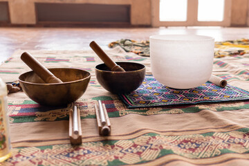 Instruments producing harmonic sounds. Tibetan and quartz singing bowls