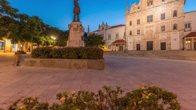 Panorama showing Sa da Bandeira Square with a view of Santarem See Cathedral aka Nossa Senhora da Conceicao Church day to night transition timelapse, built in Mannerist style. Walking area. Portugal