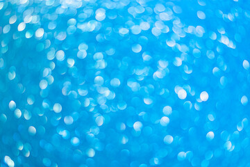 Abstract blurred background. Defocused portrait lens back. Backdrop bokeh. Vivid blue.