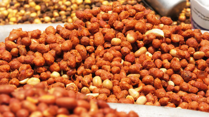 Roasted nuts ready for sale in a street shop