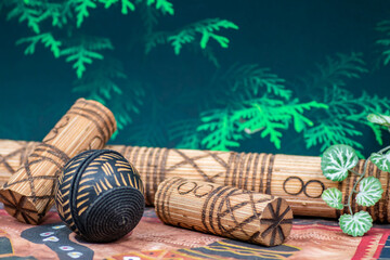 Musical traditional ethnical and tribal rhythmic idiophones made of wood with some grains or send...