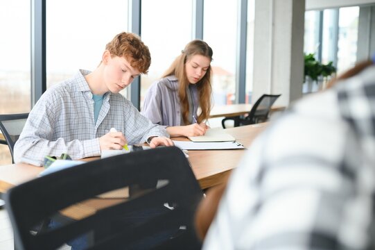 Students studying in library or classroom