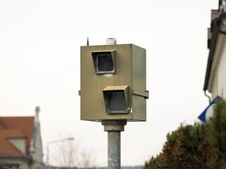 Old speed camera in Germany. Close up of the radar control traffic monitoring box that shoots...