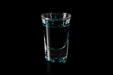 Shot glass with blue drink