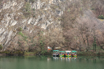 View of beautiful tourist attraction, lake at Matka Canyon in the Skopje surroundings. Macedonia. - 755908885