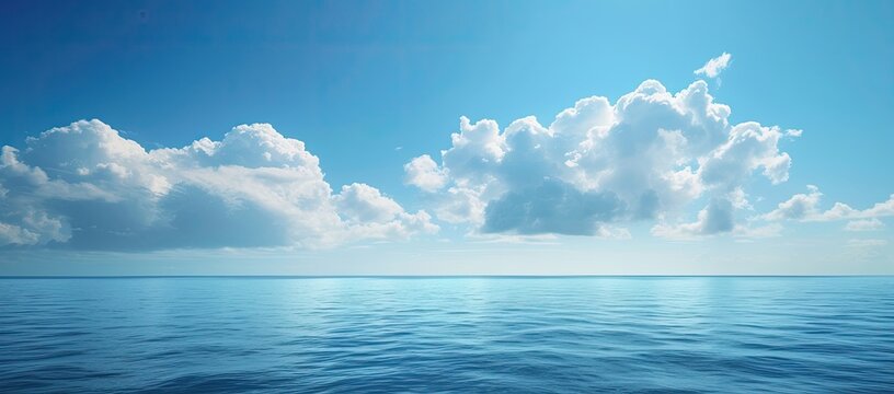 Captivating images capture the serene blue sea under a breathtakingly beautiful sky, a scene of tranquil perfection