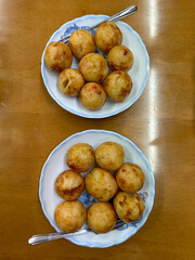 Takoyaki is a popular snack in Osaka. Takoyaki Japanese food octopus balls. Directly above.