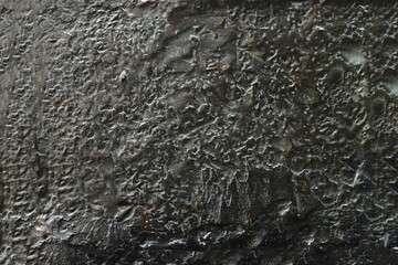 Abstract background from a relief metal surface.