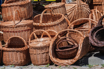 Wicker handmade baskets at the folk market - 755929036