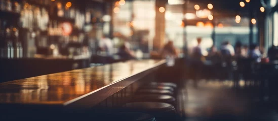 Gordijnen Blurry coffee shop or restaurant image with vintage bokeh background. © Vusal