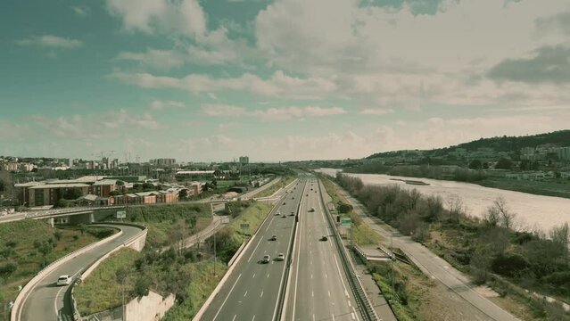Aerial view of M6202 highway leading to Nice along the Var River, French Riviera