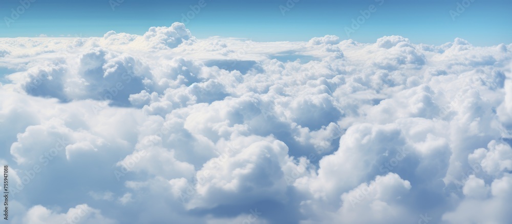 Aufkleber the view from the airplane window reveals a cloudy sky with cumulus clouds scattered throughout the 