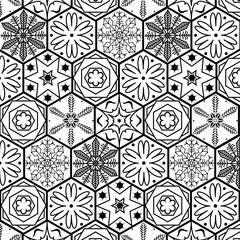 Pattern of black and white ornaments.Vector seamless black and white pattern of individual elements.