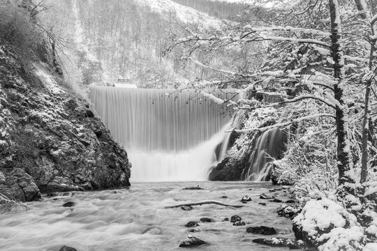 Dam on the river in narrow canyon during winter, river Djetinja, Uzice, Serbia