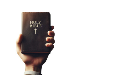 Hand holding the holy bible. Isolated transparent PNG background. Salvation through the holy scriptures concept. With copy space. Repentance, Forgiveness, Gospel, Kingdom, Resurrection. - obrazy, fototapety, plakaty