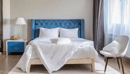 Fototapeta na wymiar interior with white bed linen on the sofa bedroom with bed white bedding and bedside table white pillows duvet and duvet case on bed with blue headboard front view