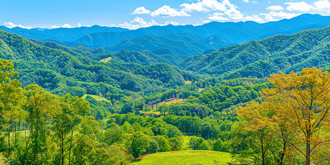 A view of a valley with towering mountains in the background under a clear sky