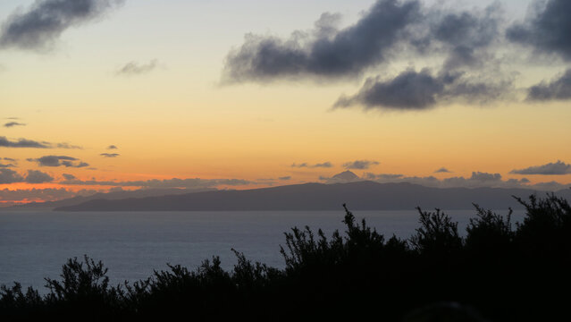 View from Serra de Santa B&aacute;rbara, Terceira Island (Azores) at night. Cloudy and starry sunset at high point.            