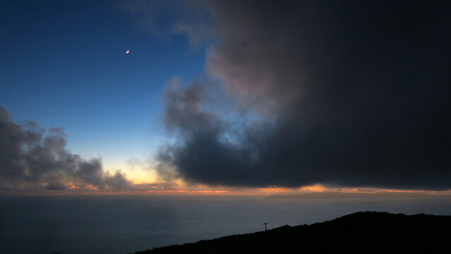 View from Serra de Santa B&aacute;rbara, Terceira Island (Azores) at night. Cloudy and starry sunset at high point.            