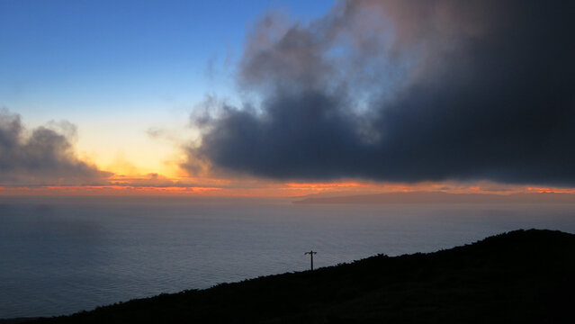 View from Serra de Santa B&aacute;rbara, Terceira Island (Azores) at night. Cloudy and starry sunset at high point.            