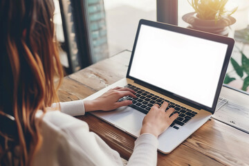 Woman working on her laptop in a home office remote work, mockup