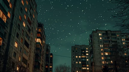 Deurstickers Residential area, panel buildings in Kyiv. Evening, lights on in some windows, against the background of the starry sky © Olivia