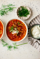 Cabbage rolls soup in a ceramic bowl on a table.  .style hugge
