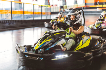 Intense Go-Kart Race with Focused Female Driver