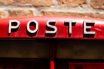 Close-Up of 'Poste' Sign on Italian Mailbox in Venice