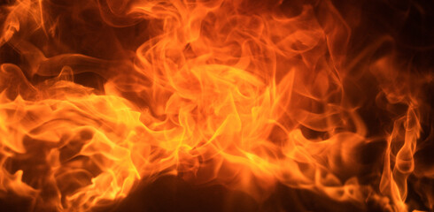 Fire flame background. Burning fireplace. Fireplace texture. Abstract flames, Burning concept. © Volodymyr