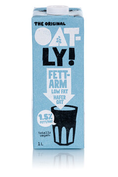 Oatly vegan oat milk Low Fat flavor isolated on a white background portrait format