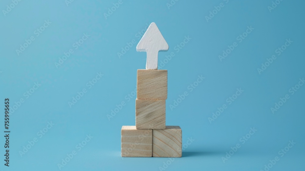 Aufkleber a wooden block with a white arrow, suitable for various concepts.