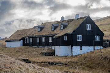 Traditional wooden farmhouse with grass roof on the Faroe Island of Vidoy