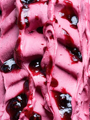 Frozen Pomegranate flavour gelato - full frame detail. Close up of a pink surface texture of Ice...