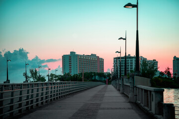 Beautiful Tropical Sunrise Cityscape over the Puente Dos Hermanos Bridge and modern high rising...