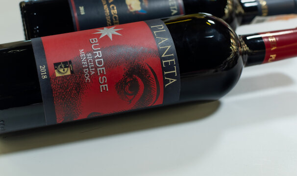 Bottle of Sicilia red wine Planeta Burdese Menfi DOC 2018 close-up on white background. Ukraine, Zhytomyr, February 27, 2024
