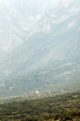 Fototapeta premium A mountain with a cargo truck on the road