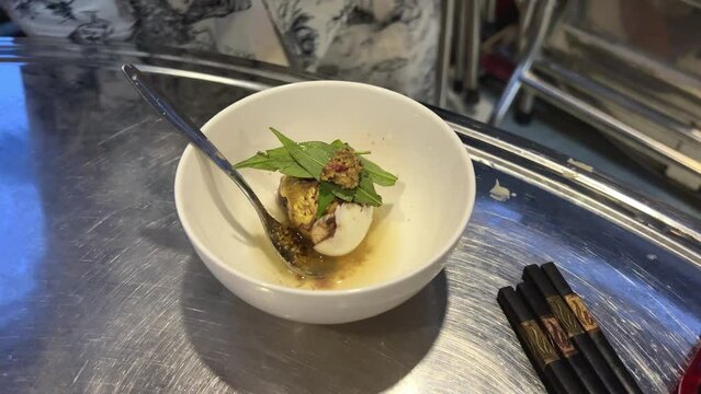 Egg with embryo Vietnamese delicacy. Balut boiled developing duck embryo in Hoi An, Vietnam. special cuisine in Asian countries.