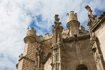 Detailed view at the lateral ornaments tower, gothic monument building Primate Cathedral of Saint Mary of Toledo