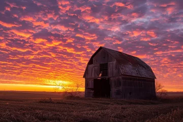 Fotobehang beautiful sunset over an Iowa barn © Aliaksandr Siamko