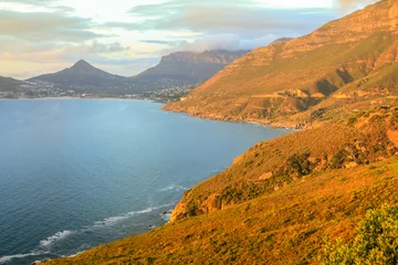 Fototapeten The Lookout Point at sunset in Hout Bay. The famous and scenic Chapman's Peak Drive in Cape Town, South Africa. © bennymarty