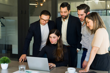 Business team working together on a business proposal