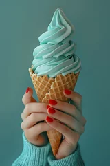 Foto op Plexiglas Hands with red nail polish holding ice cream of mint flavor, generative ai © Diana Vyshniakova