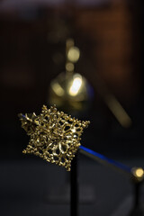 Detail of the top of the golden scepter.