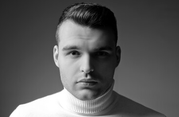 Man close up face with glossy hairstyle. Barbershop concept. Handsome guy. Masculinity and beauty....