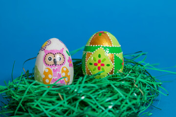 Easter egg on blue background. Religious symbol