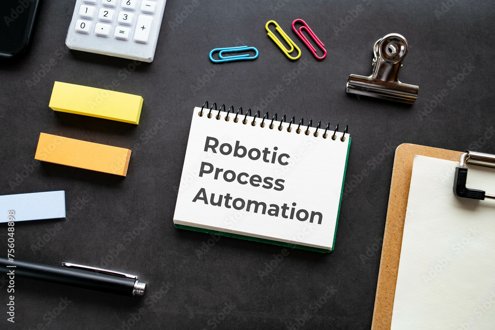Poster there is notebook with the word robotic process automation. it is as an eye-catching image.